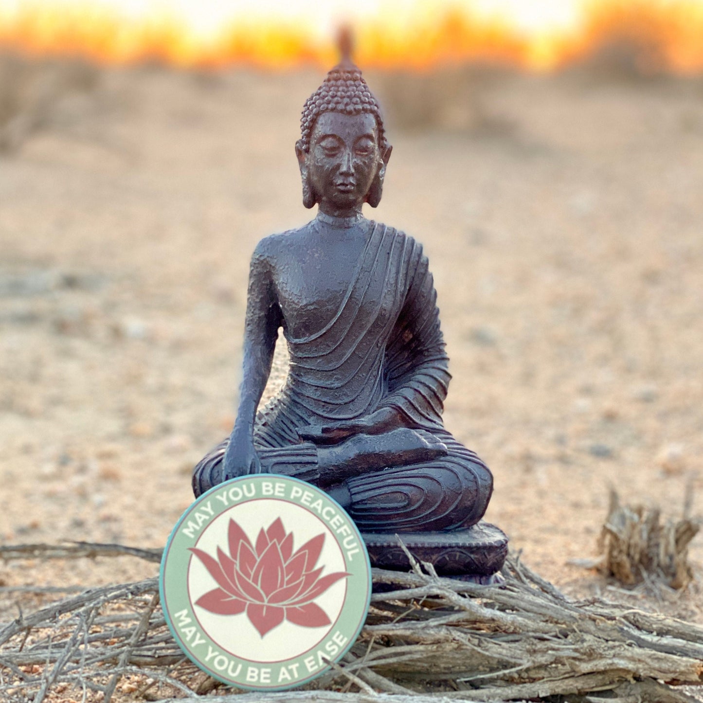 Statue of a meditating Buddha with a 3.5" lotus flower magnet with the metta prayer, 'may you be peaceful may you be at ease'