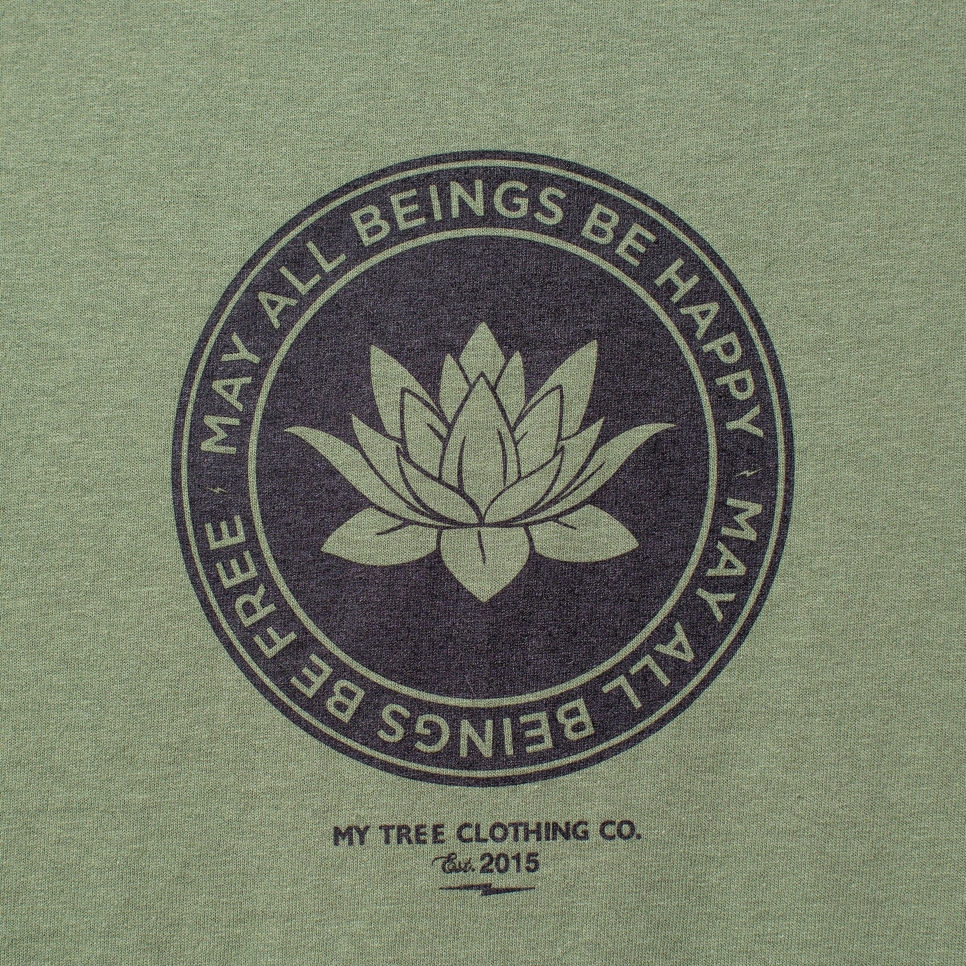 Green t-shirt with lotus flower design and text on a green background.