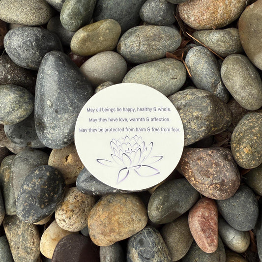 3" circular sticker with Buddhist prayer and a lotus design.