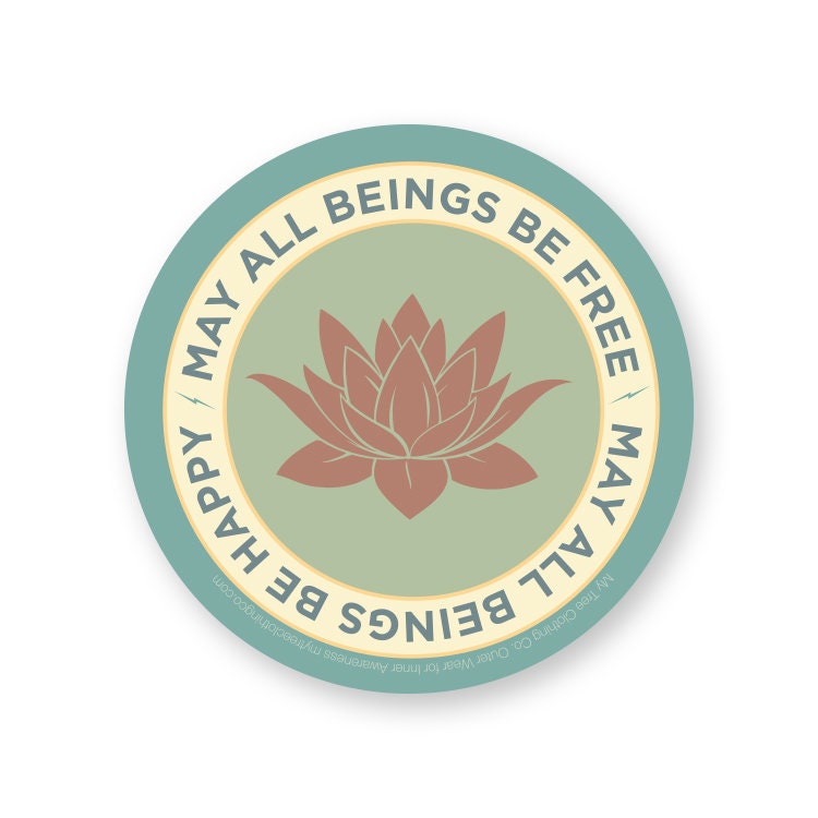 Circular sticker with lotus flower and text 'May all beings be free, happy' on a white background